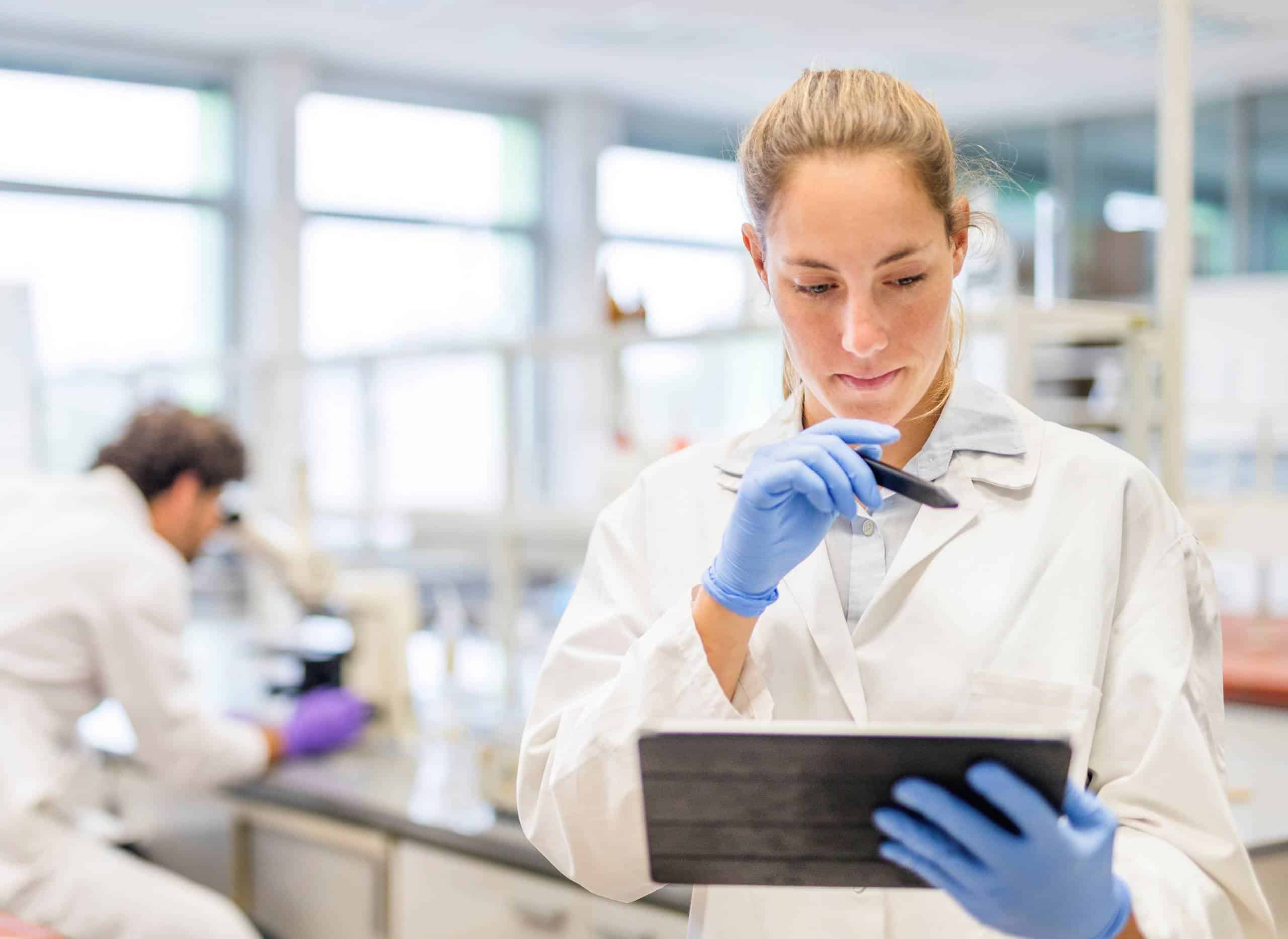 Female scientist working with a digital tablet in the laboratory